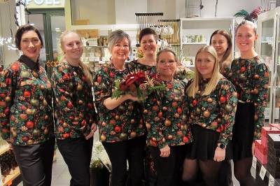 Kledd for julehandel med blomster