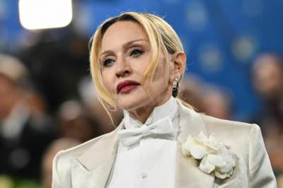 Madonna trygler fansen: Lover finnerlønn