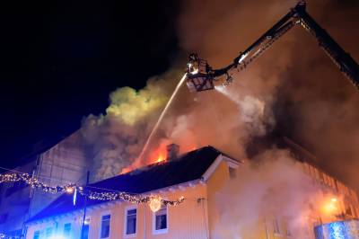 Brann i butikklokale i Kristiansand – naboer evakueres