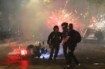 Ville tilstander i Paris: Minst 235 pågrepet