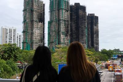 Hongkong: 13 personer pågrepet i forbindelse med brannetterforskningen