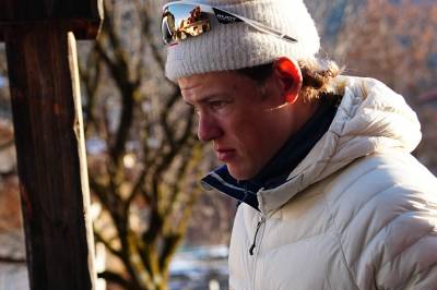 I bakgrunnen gliser Putin