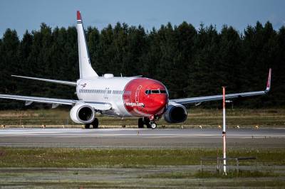 Norwegian-aksjen faller etter gigantavtale med Stordalen