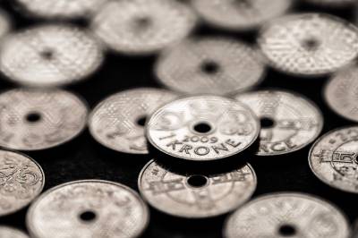 Den norske krona fyller 150 år – eksperter tror kontantene lever videre