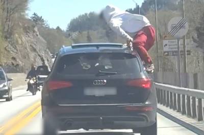 Klatrer på bilen i 70 km/t