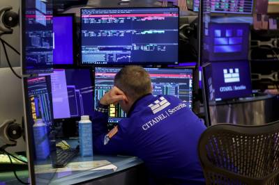 Wall Street blandet: Store svingninger før rentebeslutning