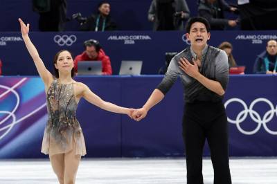 De japanske kunstløperne Riku Miura og Ryuichi Kihara vinner gullmedalje til musikken fra Gladiator