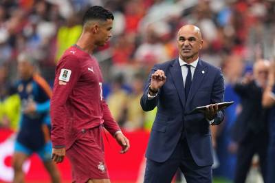 Portugal-treneren gir seg